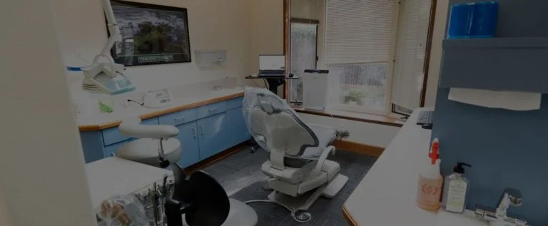 Modern dental treatment room with a patient chair